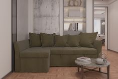 a living room with a couch, coffee table and bookshelf in the corner