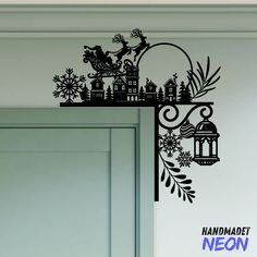 a black and white wall decal with a birdcage on it's side