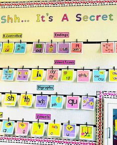 a bulletin board that has different types of words and pictures on it with magnets attached to the boards