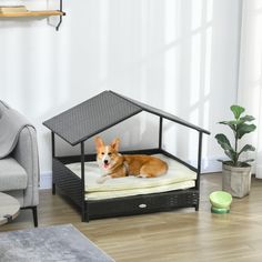 a dog laying on top of a bed in a living room