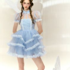 A bright and sophisticated blue. A pale blue dress decorated with polka dots and transparent lace embroidery. The skirt part is layered with ruffles to create an elegant volume. The way it sways gently every time you move is romantic. 
 
 Size 
 
 S size 
 
 Length: 83cm 
 Shoulder width: 32cm 
 Bust: 82cm 
 Waist: 64cm 
 Sleeve length: 21cm 
 
 M size 
 
 Length: 84cm 
 Shoulder width: 33cm 
 Bust: 86cm 
 Waist: 68cm 
 Sleeve length: 21.5cm 
 
 L size 
 
 Length: 85cm 
 Shoulder width: 34cm 
 B Pale Blue Dresses, Lace Embroidery, Pale Blue, Tiered Dress, Ruffles, Blue Dresses, Polka Dots, Dots, Sleeve Length