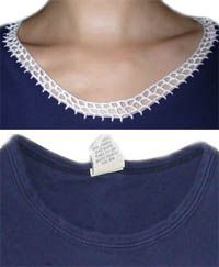 a woman wearing a blue shirt with white lace on the neck and an image of a women's t - shirt