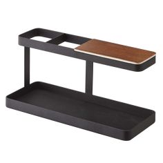 a black tray with a wooden top and two sections on the bottom that are connected to each other