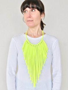 This vibrant necklace is very light, soft, and versatile you can wear it during the day or for an event in the evening, I can assure you it won´t disappoint you.What we love about this design is that you can adjust the length, just tie it to the height you want.• Length - 35 cms = 13,8"  app (longest fringe)• Colors - neon yellow, neon green, neon orange and neon fuchsia.• Material - 100% peruvian lycra cotton• Hand wash cold, hang dry100% handmade by BNN Thank you for stopping by! Bold Handmade Necklace For Party, Handmade Bold Necklace For Party, Handmade Necklaces For Spring Parties, Trendy Green Choker For Party, Spring Party Green Necklaces, Summer Party Long Necklaces, Green Necklaces For Summer Parties, Neon Jewelry For Summer Gifts, Yellow Choker Necklace For Summer