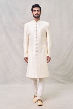 Cream full sleeves sherwani with all over bahar vine thread embroidery using sequin highlights. Paired with a churidar and a bloom embroidered dupatta. - Aza Fashions Cream Sherwani, Sequin Art, Cream Art, Embroidered Dupatta, Thread Embroidery, Silk Embroidery, Band Collar, Churidar, Full Sleeves