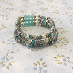 Never Been Worn, Brand New. Beautiful Colors! Turquoise Bohemian Bangle Crystal Bracelet, Spiritual Beaded Turquoise Wrap Bracelet, Spiritual Turquoise Beaded Wrap Bracelet, Spiritual Turquoise Beaded Stretch Bracelet, Turquoise Beaded Healing Bracelets, Turquoise Wrap Bracelet With Faceted Beads As Gift, Turquoise Beaded Bangle With Natural Stones, Turquoise Crystal Bracelet With Colorful Beads, Turquoise Bangle Beaded Bracelets With Natural Stones