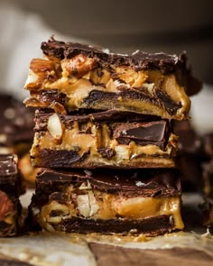 a stack of pieces of chocolate and nuts