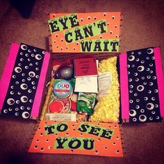 an open box filled with candy and candies that says, eye can't wait to see you