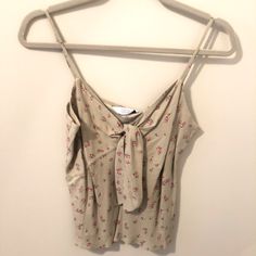 This Is A Tank Top From & Other Stories. It Is 100% Rayon. This Too Simply Did Not Fit Me Correctly, But It Is Beautiful. I Would Also Say That While This Is A Size 10, It Fits Small. Fits Like A Medium. Casual Beige Camisole For Day Out, Casual Beige Camisole For Spring, Beige Cami Top For Spring, Beige Sleeveless Floral Print Top, Sleeveless Beige Floral Print Top, Tie Strap Tank Top, Ribbed Racerback Tank Top, Polka Dot Tank Top, Green Tank Top