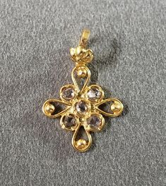 1. 18k Gold Diamond Pendant 2. Made to Order 3. Gemstone - Diamond 4. Jewelry Type - Pendant 5. Total weight - 0.440 Gram Approx 6. Diamond Weight - 0.10 Carats 7. Gold Weight - 0.420 Grams Approx. 8. Gold Purity - 18k 9. Pendant Bails Outer Size - 4.80 mm 10. Diamond Shape - Round 11. Complete your necklace 12. Ready to dispatch in 1 - 2 days. 13. Handmade Items 14. AAA Quality Pendant Pictures are taken under natural and day light. Rose Cut Diamond Pendant Jewelry, Diamond White Pendant Jewelry With Rose Cut Diamonds, Diamond White Pendant With Rose Cut Diamonds, Rose Cut Diamonds Flower Pendant For Anniversary, 22k Gold Diamond Cut Jewelry For Anniversary, Gold Brilliant Cut Flower Pendant Jewelry, Anniversary 22k Gold Jewelry With Diamond Cut, Victorian 22k Gold Hallmarked Jewelry, Yellow Gold Pendant With Rose Cut Diamonds