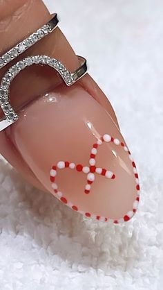 40K views · 1.6K reactions | So happy you Cane into my life. 🤍❤️ - - - -Easy to do Candy Cane style…🤍❤️ -Tools: Double sided dotter or Toothpick - - - - - - - #perthnailtech #nails #christmasnails #trending #viral #reels #featured #instagood #candycanenails #foryou #xmasnails #beauty #christmasnailsart #christmasnailsart #xmasnails #nailtutorial #inspo #beautiful #nailtutorialvideo #unhas #nailitdaily #revolvebeauty #christmas #getnailed #christmasdesign #kiaraskynails #nailswag #nailsmagazine #explore #explorepage | Ty Nguyen | Ariana Grande · Santa Tell Me | Lovely Nails and Beauty Ariana Grande Santa Tell Me, Candy Cane Nail Art, Nail Maintenance, Santa Tell Me, Lovely Nails, Nail Candy, Seasonal Nails