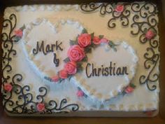 a cake decorated with roses and the words mark and christian