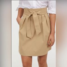 Nwt H&M Khaki Skirt Womens Size 2 H&M New With Tags Beige Mini Skirt For Spring Workwear, Beige Skort For Spring Workwear, Beige Skort For Workwear In Spring, Short Skirt For Spring Workwear, Midi Skort For Workwear, Beige Cotton Mini Skirt For Work, Spring Workwear Knee-length Skort, H&m Relaxed Lined Skirt, H&m Relaxed Fit Lined Skirt