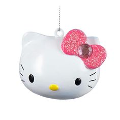 a hello kitty ornament hanging from a chain