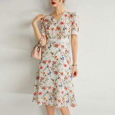 Silk V-neck Dress For Vacation, Summer Midi Dress With Floral Print And Notched Neckline, Casual Spring Midi Dress With Notched Neckline, Silk V-neck Summer Dress, Elegant V-neck Dress For Spring Garden Party, Elegant V-neck Midi Dress For Garden Party, Summer V-neck Short Sleeve Chiffon Dress, Summer V-neck Chiffon Dress With Short Sleeves, Chic V-neck Silk Dress With Floral Print