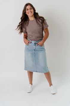 Nothing says summer like a light wash denim skirt! The 'Jamie' is sure to be your new favorite with its high-waist fit and subtle stretch. Functional front and back pockets are also the perfect place to stash all your small essentials! Pair the 'Jamie' with a tee and white sneakers for a day out on the town! 97% Cotton 3% Spandex Machine Wash Cold Do Not Bleach Hang to Dry Low Iron if Needed Model A Height 5'9" | Wearing Size 4 Model B Height 5'6" | Wearing Size 6 Model C Height 5'8" | Wearing S Jean Skirt And Sneakers Outfit, Jean Skirt And Tights Outfit, Trendy Light Wash Denim Skirt, High Rise Washed Cotton Denim Skirt, High Waist Relaxed Fit Medium Wash Denim Skirt, Everyday Light Wash Denim Skirt, Light Wash Denim Skirt For Everyday, Everyday High Rise Light Wash Denim Skirt, Casual Light Wash Denim Skirt For Summer