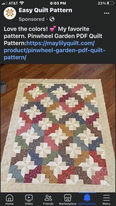 a quilt is shown on the phone screen