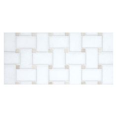 a white tile wall with squares and rectangles