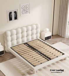 a white bed frame with wooden slats in a modern style bedroom, designed by everlasing