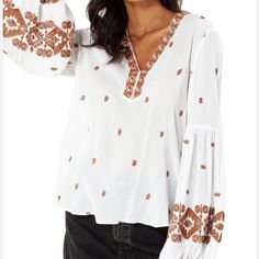 New With Tags White Blouse With Embroidered Sleeves For Fall, Chic White V-neck Embroidered Top, White Long Sleeve Tops With Geometric Embroidery, White V-neck Blouse With Embroidered Sleeves, Chic White Tops With Embroidered Sleeves, White Chic Embroidered Top With Floral Design, Chic White Embroidered Top With Floral Embroidery, Chic White Embroidered Top With Floral Design, Chic White Embroidered Blouse