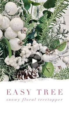 an easy tree snow floral arrangement with pine cones and berries