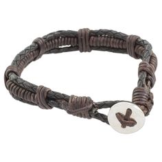 This simple leather bracelet will add charm for any casual outing. The young artisans at Jalapa Girl Jewelsmiths work together to create this bracelet, closing it with a button made of fine silver. Leather & sterling silver Button clasp High polish finish Avoid contact with water 8.25" L Handmade in & fairly traded from Guatemala Simple Leather Bracelet, Paw Print Jewelry, Ribbon Jewelry, Simple Leather, Wristband Bracelet, Printed Jewelry, Braided Leather Bracelet, Braided Bracelet, Silver Buttons