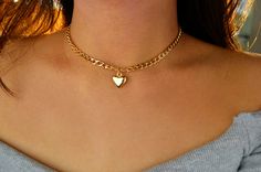 Chain is adjustable. (Not a real locket) Gold Metal Heart Choker Necklace, Gold Heart Charm Choker Jewelry, Chunky Chain Heart Pendant Jewelry Gift, Trendy Heart Charm Choker Jewelry, Gold Heart Charm Choker, Heart Pendant Gold Chain Jewelry, Gold Chain Heart Pendant Jewelry, Heart Shaped Gold Chain Jewelry, Heart-shaped Gold Chain Jewelry