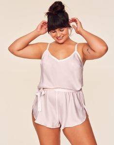 Our silky-smooth Kami Romper is all about understated elegance. Made from ultra-luxe satin with a matching sash tie to highlight your waist, this one-piece makes for an easy yet practical lingerie piece you can wear all night long. (Available in plus-sizes XS–4X.) Feminine Satin Sleepwear For Loungewear, Feminine Satin Finish Sleepwear For Loungewear, Chic Satin Sleepwear For Summer, Chic Satin Finish Sleepwear, Elegant Sleepwear With Tie Waist, Chic Sleepwear With Built-in Bra, Chic Satin Sleepwear, Chic Bra, Adore Me