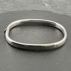 Vintage Sterling Silver Hinged Stacker Spacer Bangle, Internal Diameter 61.6mm, Bangle Width 6mm, Weight 12.69 Grams, Lovely Condition Modernist Silver Bangle Jewelry, Luxury Modernist Sterling Silver Bracelet, Vintage Silver Bangle, Collectible, Modernist Polished Silver Cuff Bracelet, Modernist Hallmarked Sterling Silver Bracelet, Sterling Silver Bracelet, Contemporary Jewelry, Vintage Sterling Silver, Hinges