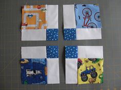 four blocks are laid out on the table to make a quilted wall hangings