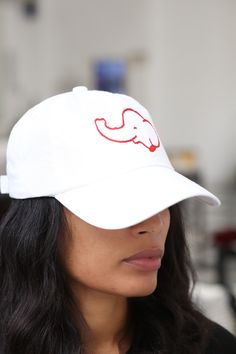 With unique designs you won't find anywhere else, our caps are the quality type that are designed with a thicker woven fabric. Not those flimsy weak ones that lose shape. 100% stitched embroidered design. Sport cap. Curved brim. Dry Clean Only. Comes in: adjust back. Perfect for those Devastating Divas who needs head/face protection from the sun, sweat and elements while out doing fitness, events or anything fun. White Curved Bill Fitted Hat For Streetwear, White Fitted Hat With Curved Bill For Streetwear, Embroidered White Baseball Cap For Streetwear, White Embroidered Baseball Cap For Streetwear, White Embroidered Cotton Baseball Cap, White Cotton Fitted Hat With Curved Bill, White Baseball Cap With Curved Bill For Streetwear, White Curved Bill Baseball Cap For Streetwear, White Baseball Cap With Embroidered Logo