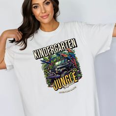 Kindergarten Jungle Squad tee is the perfect back to school shirt. If you desire an oversized look, size up 1 to 2 sizes (1 should be enough).  Comfort Colors introduces the "Comfort Colors 1717" garment-dyed t-shirt; a fully customizable tee made 100% with ring-spun cotton. The soft-washed, garment-dyed fabric brings extra coziness to your wardrobe while the relaxed fit makes it an excellent daily choice. The double-needle stitching throughout the tee makes it highly durable while the lack of s Summer Streetwear T-shirt With School Spirit, School T-shirt With Graphic Print And Relaxed Fit, Relaxed Fit Graphic Print T-shirt For School, Casual Relaxed Fit T-shirt For Back To School, School T-shirt With Text Print And Relaxed Fit, Casual Back To School T-shirt With Funny Print, Casual Funny Print T-shirt For Back To School, Casual T-shirt With Funny Print For Back To School, Casual Back-to-school T-shirt With Funny Print