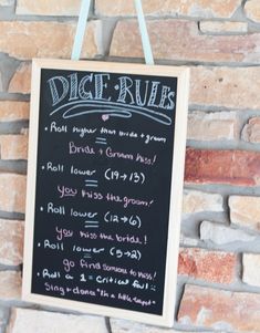 a sign hanging from the side of a brick wall that says dige rue on it