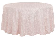 a round table covered with a pink satin tablecloth and pleated design on the top