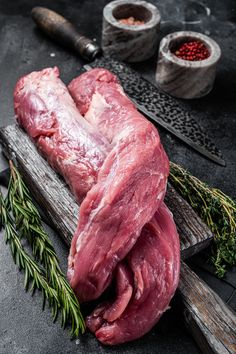 raw meat with herbs and spices on the table