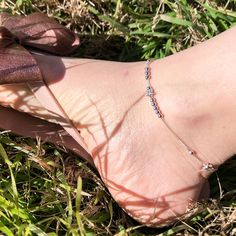 Add a touch of celestial elegance to your ankle with our Stars and Balls Charm Sterling Silver Anklet. The box chain adds extra durability while the stars and balls charm dangles delicately, making it perfect for any occasion. Elevate your style and let your ankles shine like the stars in the sky! Materials: 925 sterling silverChain length: 8..75 -10 in adjustable Jewelry Care: See more information about how to care for your jewelry here. Shipping Policy: Orders will be shipped within 1-3 business days. Economy shipping will take 7-14 days to arrive and standard shipping is 1- 4 days for U.S. orders. International shipping time is depended on the country and per shipping method. Shipping cost will be calculated at check out.For more details, see our Shipping Policy. Return Policy: Free ret Elegant Silver Anklets With Tiny Beads, Shine Like The Stars, Stars In The Sky, Silver Anklet, Women Anklets, Sterling Silver Anklet, Silver Jewelry Earrings, Adjustable Jewelry, Handmade Fashion Jewelry