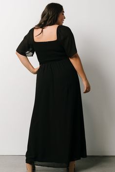 Our cute maxi dress is made of lightweight chiffon material and comes in our classic black color. This dress has a smocked back bodice and a sweetheart neckline. Chiffon Square Neck Dress For Date Night, Chic Maxi Dress With Sweetheart Neckline And Smocked Back, Fitted Chiffon Maxi Dress With Smocked Back, Black Midi Dresses With Elastic Sleeves, Evening Dresses With Smocked Back In Chiffon, Black Flowy Dress With Elastic Sleeves, Fitted Black Chiffon Dress For Date Night, Black Fitted Chiffon Dress For Date Night, Chic Chiffon Maxi Dress With Smocked Bodice