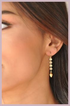 Our very flirty dangle earrings are made of tiny disc or sequin chain. Your choice of a gold dangle or pearl dangle to finish them off. Super light weight and ultra comfy to wear. Our gift to you 10% off your first purchase. Details here - http:/eepurl.com/dpVPBz DETAILS Total earring length including ear wire is 1.5" 14 k gold fill or sterling silver chain and ear wires 24 k gold or sterling silver dangle or freshwater pearl dangle Gold Teardrop Tassel Earrings, Tassel Drop Earrings For Wedding, Gold Plated Drop Threader Earrings, Delicate Dangle Teardrop Earrings, Elegant Gold Tassel Earrings With Ear Wire, Elegant Gold Teardrop Tassel Earrings, Gold-plated Chandelier Earrings With Latkans, 14k Gold Filled Linear Earrings With Ear Wire, Gold Plated Linear Earrings For Party