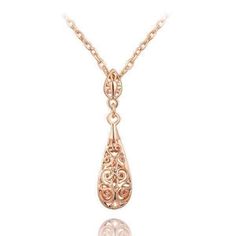 With the finest patterns of scrolling and interlacing tendrils, this vintage feel necklace is truly a work of art. The teardrop is a puffed cage of delicate filigree dangling from a small medallion bail. Hanging 1 1/2 inch from an 18 inch chain, it is both modest and dramatic. Available in Platinum or Rose Gold Plating. Get the matching Arabesque Filigree Puff Teardrop Earrings for the complete look. Size: 1 1/2 inch Chain: 18-inch chain with 2-inch extension Comes Gift Boxed (Reg $79) Twenties Style, Teardrop Necklace, Necklace Vintage, Style Necklace, Drop Pendant, Arabesque, Style Jewelry, Teardrop Earrings, Vintage Necklace