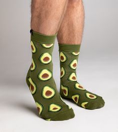 Get ready to guac 'n' roll with our one-of-a-kind Avocado Socks! Perfect for those who like their fashion as fresh as their guacamole. Crafted from the finest cotton blend, these socks promise to be the 'pits' when it comes to comfort and durability. Here's why you'll love them: 🥑 Unique Design: Adorned with a ripe avocado print that's guaranteed to turn heads, they're a conversation starter at every party or meeting. And yes, we've included the pit—because what's an avocado without it? 🥑 Comf Green Cotton Summer Socks, Casual Green Cotton Socks, Fun Green Cotton Socks, Avocado Socks, Avocado Print, Ripe Avocado, The Pit, Solid & Striped, Guacamole