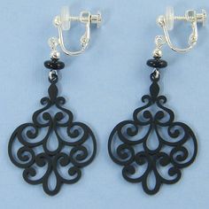 Black chandelier clip on earrings with a lacy filigree style and black glass bead accents. See all photos for size reference. Earrings are 2 1/8 inches (54mm) long with screw back and comfort cushion. Simply adjust the screw so the earrings fit your earlobe. Then, use the hinge to put them on and take them off. Silicone cushions help make the earrings more comfortable. ---------------------------------- I designed these clip on earrings and will make a pair just for you. They will ship in a cott Black Clip-on Earrings For Gift, Black Clip-on Earrings As Gift, Black Filigree Earrings, Earrings Gothic, Wrought Iron Gates, Earring Collection, Iron Gates, Gothic Victorian, Boho Lace