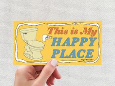 someone holding up a sticker that says,'this is my happy place '