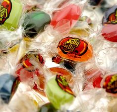 many candies are wrapped in plastic bags and ready to be used as candy bars