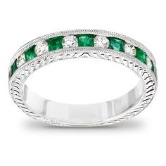 an antique style emerald and diamond wedding band