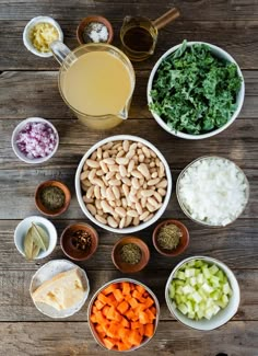 bowls filled with different types of food on top of a wooden table