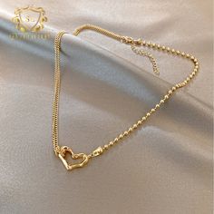 Introducing the epitome of romance and sophistication, behold the 18k Gold-Plated Heart Necklace, featuring a delicate outline of a heart pendant. This exquisite piece combines the luxurious allure of gold plating with the timeless symbolism of the heart, creating a stunning expression of love and devotion. The minimalist design of the pendant allows for effortless styling, making it the perfect complement to both casual and formal attire. Whether worn as a symbol of romantic love or as a meaningful reminder of self-love and empowerment, this necklace is sure to captivate hearts and inspire admiration wherever you go. Gold-tone Gold Plated Heart Necklace, Gold-tone Gold-plated Heart Necklace, Gold Plated Double Heart Necklace, Gold-tone Heart Necklace With Delicate Chain, Luxury Gold Double Heart Necklace, Double Heart Rose Gold-plated Necklace, Delicate Gold Heart Pendant Necklace, Gold Double Heart Clavicle Chain Necklaces, Gold Double Heart Clavicle Chain Necklace