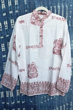 Lounge in true bohemian style, in our handmade Rayon block-printed Om Shirts from India. Looking laid-back has never been as easy as it is with these breezy shirts. Printed in traditional patterns, each shirt is unique and bears floral patterns, and Om, Ganesh, Shiva, or Buddha. Shirts have a pocket in the side panel. These shirts are handcrafted using a traditional Indian block-printing technique. We travel to the source to bring home these laid-back luxuries for you! Whether chilling on the bo Om Ganesh, Indian Block Print, Shopping World, Mint Blue, Fiery Red, Mint Color, Block Printing, Lavender Color, Traditional Indian