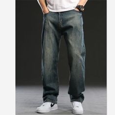 For a youthful stylish appeal, invest in these hip-hop-styled straight jeans for men that are designed in a solid pattern using denim material. These bottoms which have a mid-weight thickness are plus-sized and loose-fitting. They are full-length spring and autumn jeans with a button-fly closure and decorative pockets.Specifications Wash: Light Waist Type: MID Thickness: Midweight Style: HIP HOP Place Of Origin: China (Mainland) Pattern Type: Solid Origin: Mainland China Model Number: 2022/YD145 Hip Hop Straight Leg Medium Wash Jeans, Hip Hop Straight Leg Jeans In Medium Wash, Hip Hop Straight Leg Denim Blue Jeans, Hip Hop Straight Leg Jeans With Five Pockets, Hip Hop Style Straight Leg Denim Blue Jeans, Hip Hop Style Straight Leg Jeans With Five Pockets, Hip Hop Style Straight Leg Dark Wash Jeans, Hip Hop Style Dark Wash Straight Leg Jeans, Hip Hop Dark Wash Straight Leg Jeans