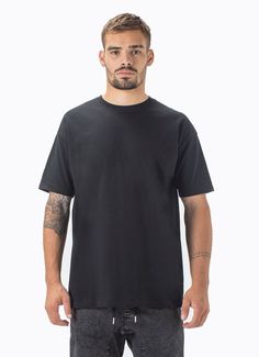 The zanerobe box tee in black - signature relaxed tee we wear with a pair of our signature sureshot joggers.  - heavy-weight 100% cotton - boxy fit - wider sleeves - standard length - thick ribbed neckline Solid Color Boxy Fit Tops For Streetwear, Black Cotton Muscle Tee For Everyday, Basic Black Crew Neck Muscle Tee, Black Relaxed Fit Muscle Tee For Everyday, Black Cotton Muscle Tee Crew Neck, Casual Black Crew Neck Muscle Tee, Black Short Sleeve Muscle Tee For Streetwear, Casual Black Muscle Tee With Short Sleeves, Black Urban Everyday Tops