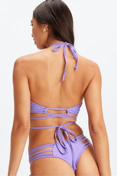 Wrap-Around Bandeau Bikini Top Fabletics purple female Activewear >> Womens >> Swim >> Tops regular Swim 4-Way Stretch/Adjustable/Removable Bra Cups/Strappy/UPF Protection Partially recycled & chlorine-resistant Click here to learn how we’re committed to keeping the earth in good shape. Purple Stretch Swimwear For Vacation, Strappy Fitted Halter Top For Pool, Adjustable Purple Swimwear For Beach, Adjustable Purple Swimwear For Swimming, Purple Stretch Tankini With Triangle Top, Purple Halter Neck Tankini For Vacation, Adjustable Purple Swimwear For Summer, Purple Stretch Tankini For Swimming, Bra Friendly Purple Swimwear For Poolside